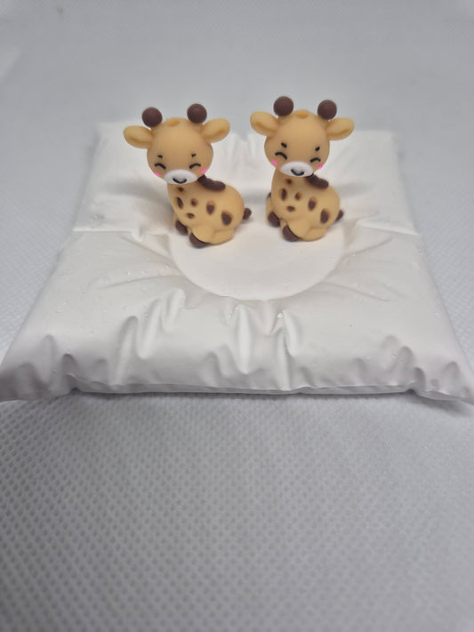 Giraffe knitting needle minders